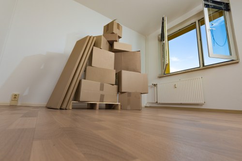 Packed moving boxes and labels prepared for storage