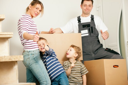 Professional movers handling furniture during an Abbeywood relocation